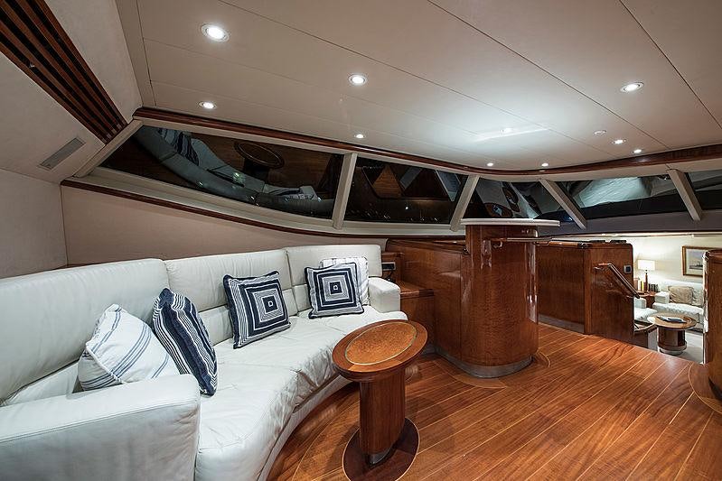 a living room with a couch and a table aboard THANDEKA Yacht for Charter