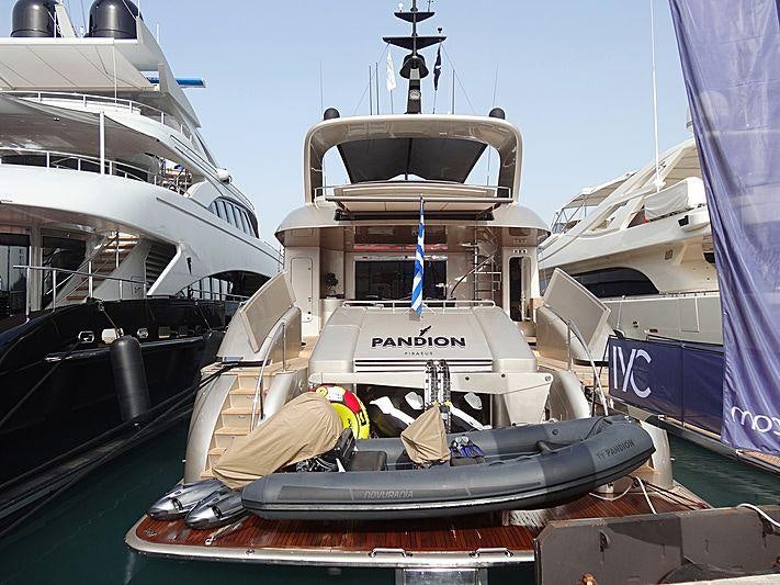 a boat on a dock aboard PANDION Yacht for Charter