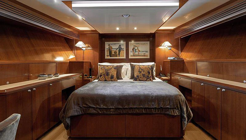 a bed in a room aboard W EXPLORER Yacht for Charter