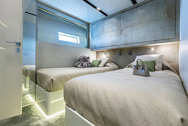 a couple of beds in a room aboard CINQUANTA-50 Yacht for Charter