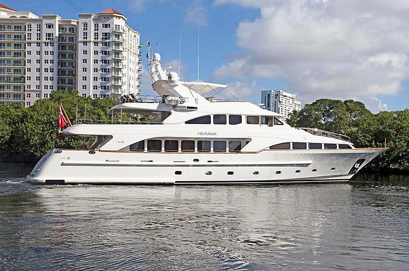 a large white boat in a body of water aboard HEAVEN CAN WAIT Yacht for Charter