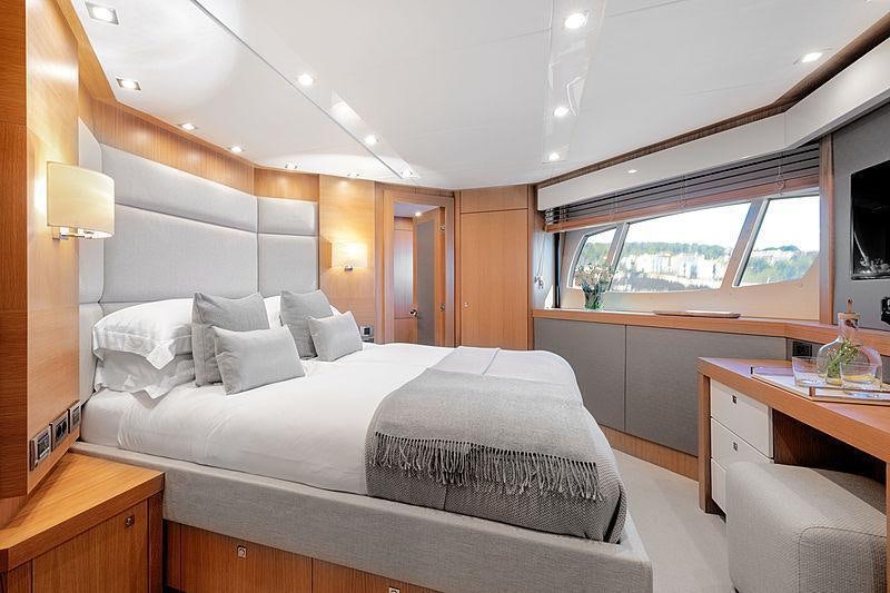a bed in a room aboard OKSANCHIK Yacht for Charter