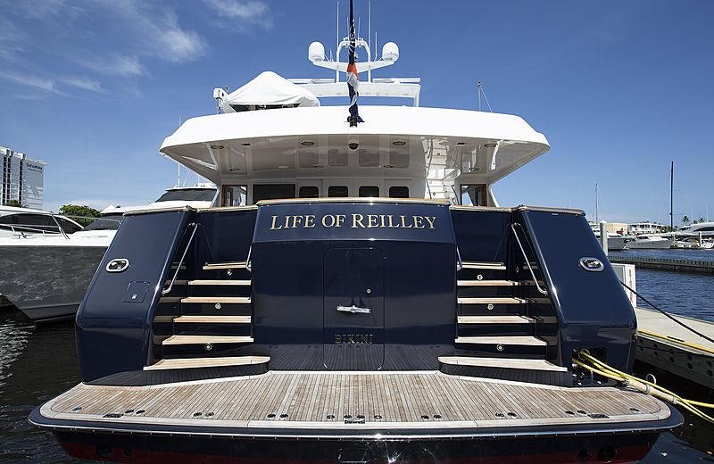 a large boat on a dock aboard GITANA Yacht for Charter