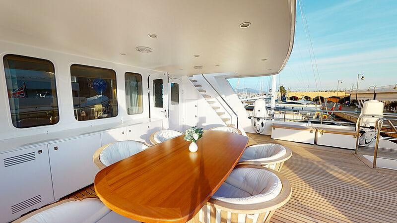 a table on a boat aboard ATOM Yacht for Charter