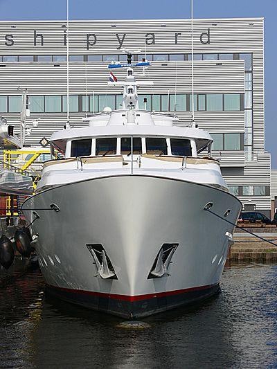 a boat in a harbor aboard CORNELIA Yacht for Charter