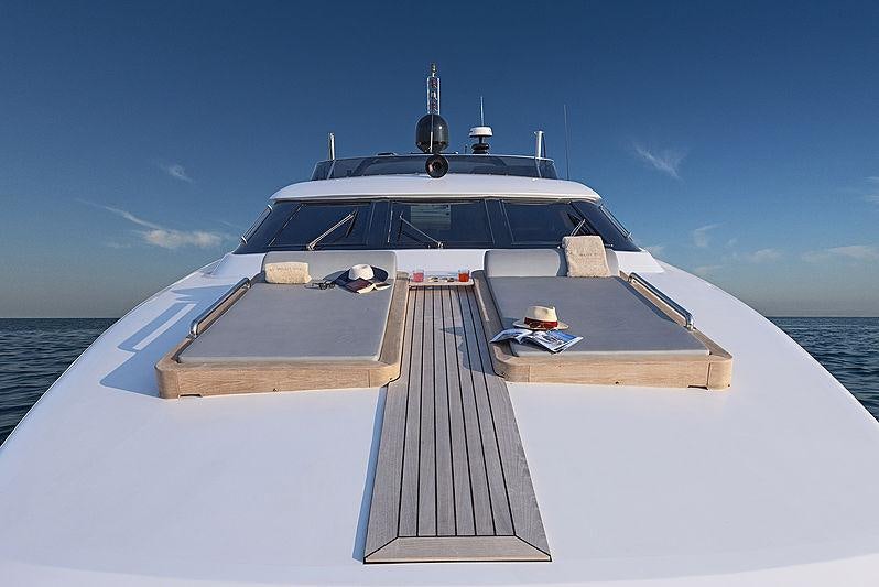 a white yacht on the water aboard PROJECT STEEL Yacht for Charter