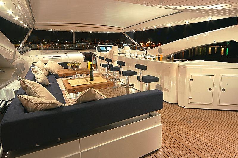 a room with a couch and a table aboard ARAGO Yacht for Charter