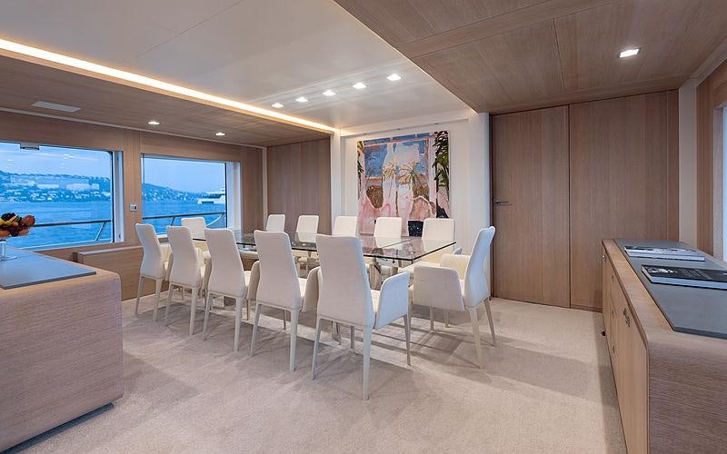 a room with chairs and tables aboard ROBBIE BOBBY Yacht for Charter