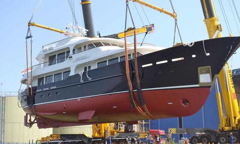 a large boat in a harbor aboard ROBBIE BOBBY Yacht for Charter