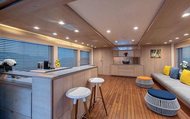 a kitchen with a large island aboard ROBBIE BOBBY Yacht for Charter