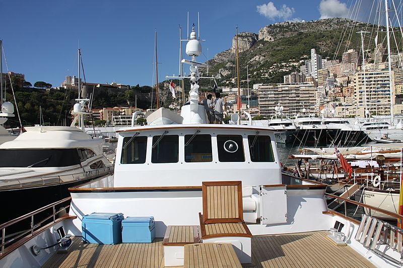 a boat docked at a pier aboard HEAVENLY DAZE Yacht for Charter