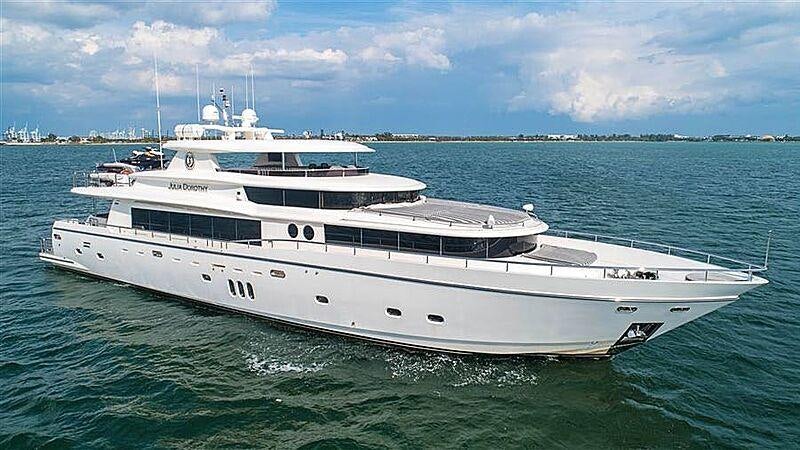 a large white boat in the water aboard JULIA DOROTHY Yacht for Charter