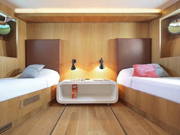 a room with two beds aboard SOUNION II Yacht for Charter