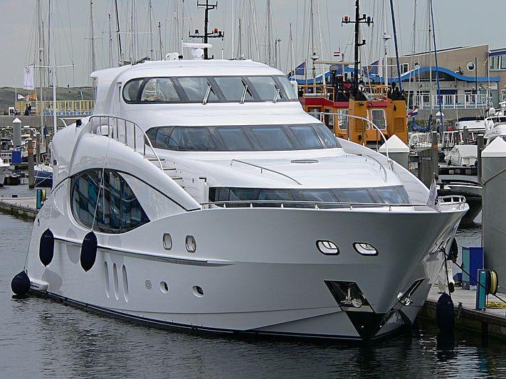 a white yacht in a harbor aboard SEA BREEZE ONE Yacht for Charter
