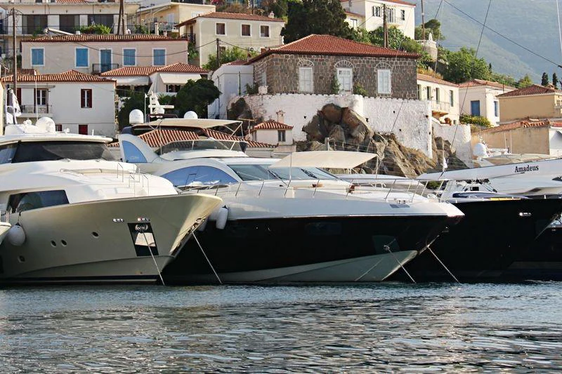 several boats in the water aboard DUKE Yacht for Charter