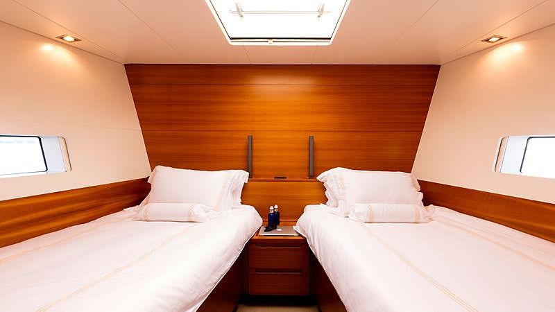 a room with two beds aboard WALLY LOVE Yacht for Charter
