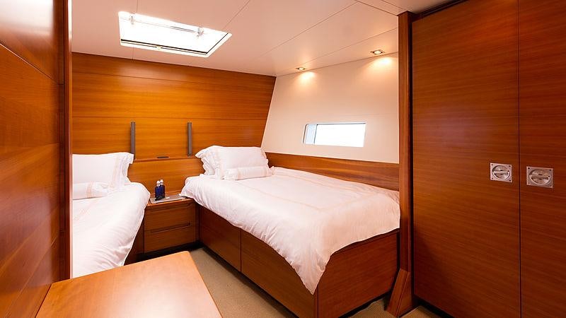 a room with two beds aboard WALLY LOVE Yacht for Charter