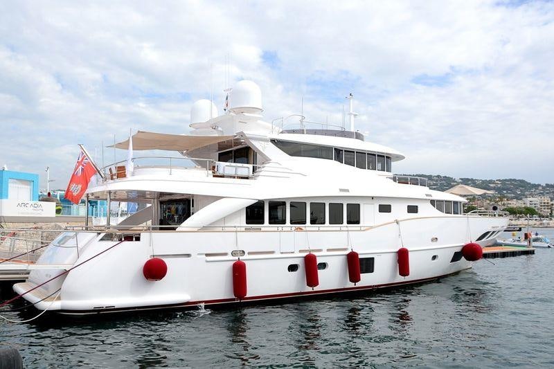 a white boat in the water aboard GATSBY Yacht for Charter