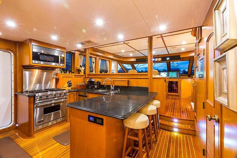 a kitchen with a large island aboard ENDLESS SUMMER Yacht for Charter