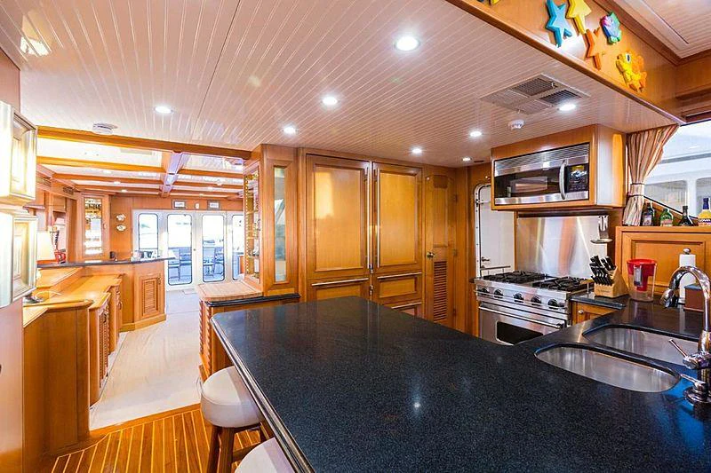 a kitchen with a large island aboard ENDLESS SUMMER Yacht for Charter