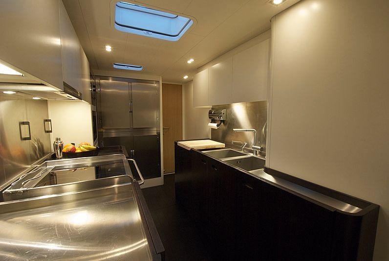 a kitchen with a sink and a counter aboard YCH2 Yacht for Charter