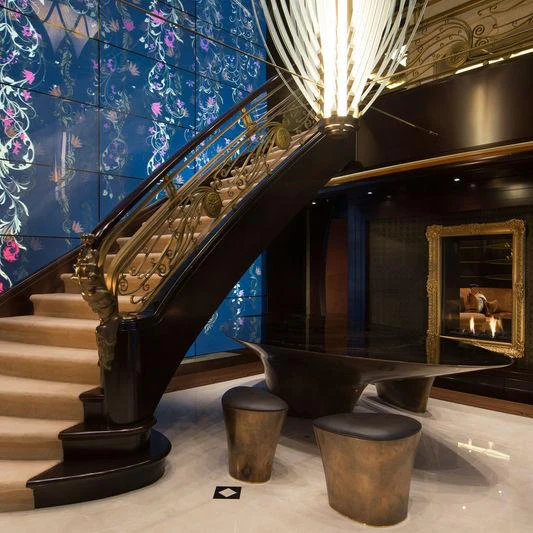 a large staircase with a large glass railing aboard WHISPER Yacht for Charter