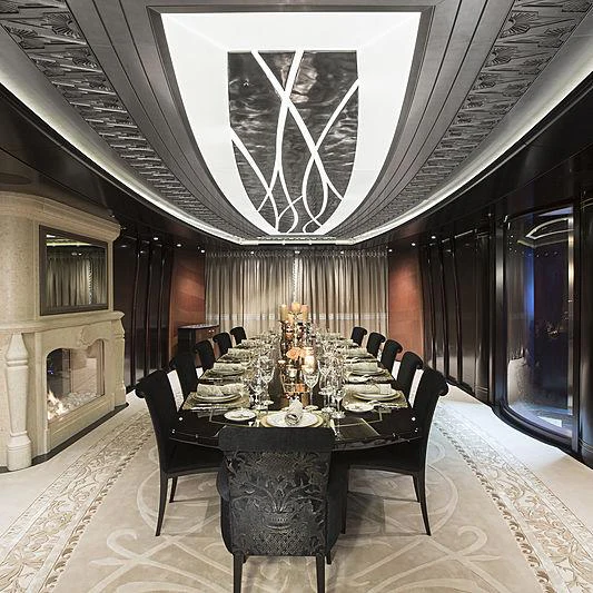 a large room with a table and chairs aboard WHISPER Yacht for Charter