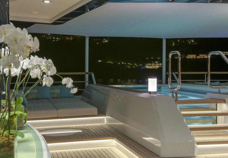 a boat with white flowers aboard SOLANDGE Yacht for Charter