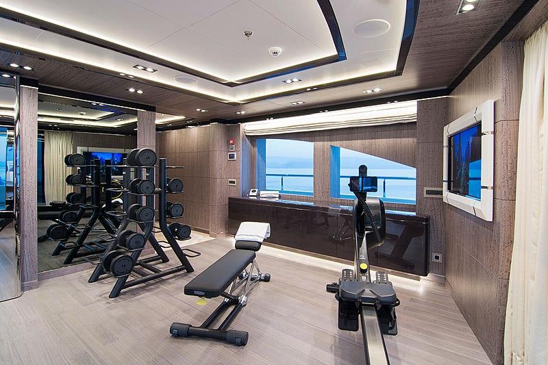 a gym with exercise equipment aboard O'PTASIA Yacht for Charter