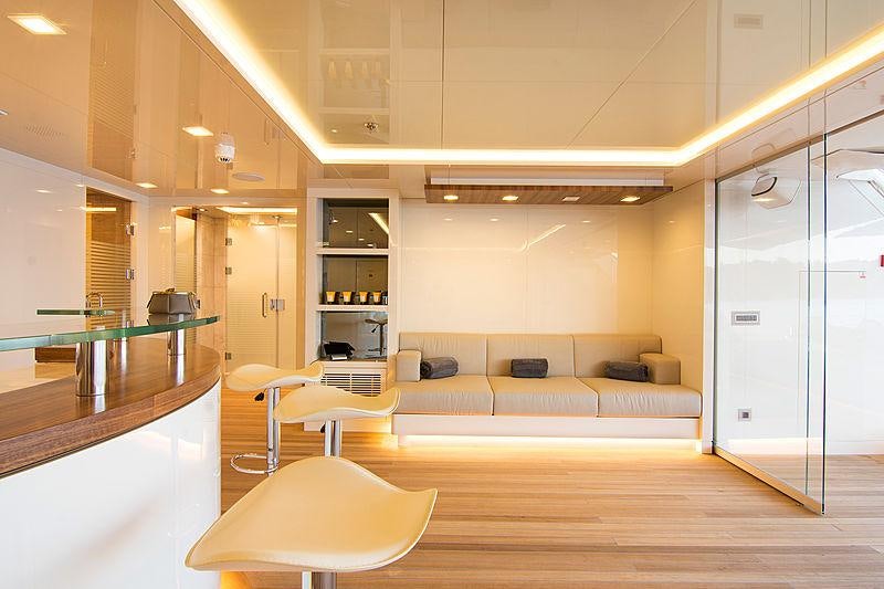 a large living room with a large open floor plan aboard O'PTASIA Yacht for Charter