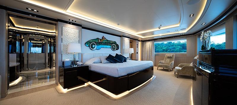 a large bedroom with a large bed aboard O'PTASIA Yacht for Charter