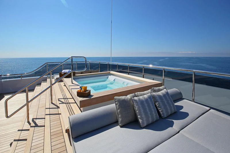 a balcony overlooking the ocean aboard PLANET NINE Yacht for Charter