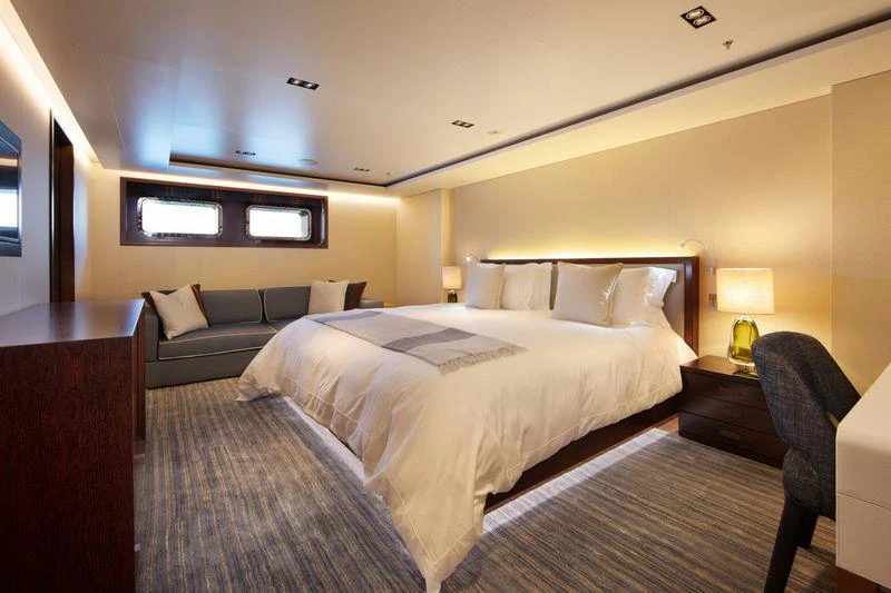 a hotel room with a bed aboard PLANET NINE Yacht for Charter