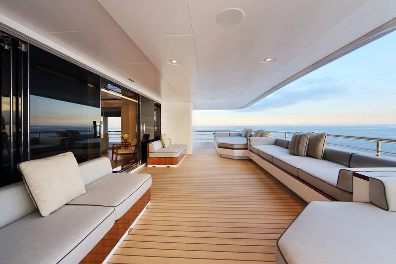 a large living room with a large window aboard PLANET NINE Yacht for Charter