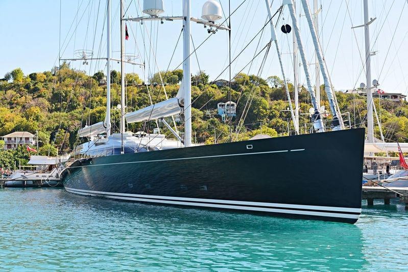 a boat docked at a pier aboard VERTIGO Yacht for Charter