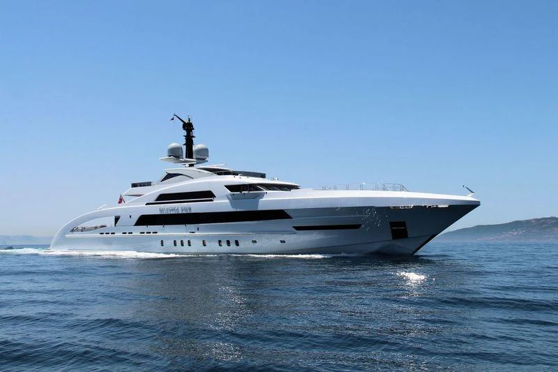a white yacht in the water aboard ILLUSION Yacht for Charter