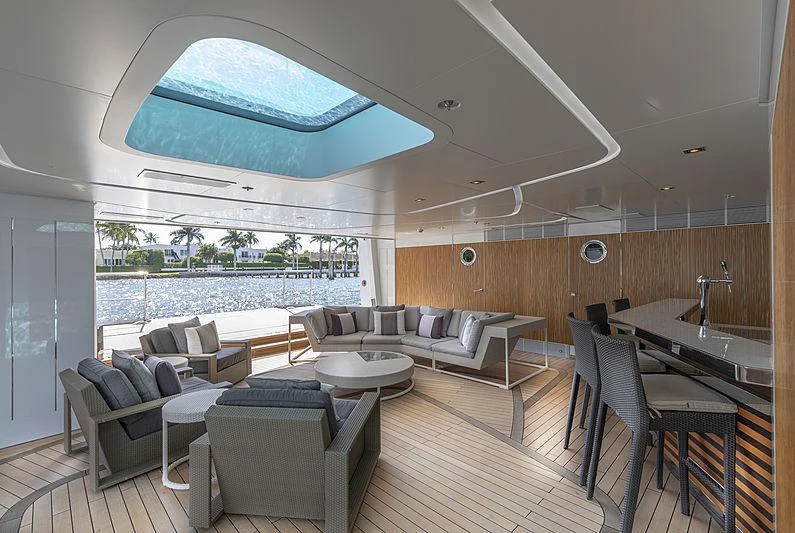 a modern looking living room aboard ILLUSION Yacht for Charter