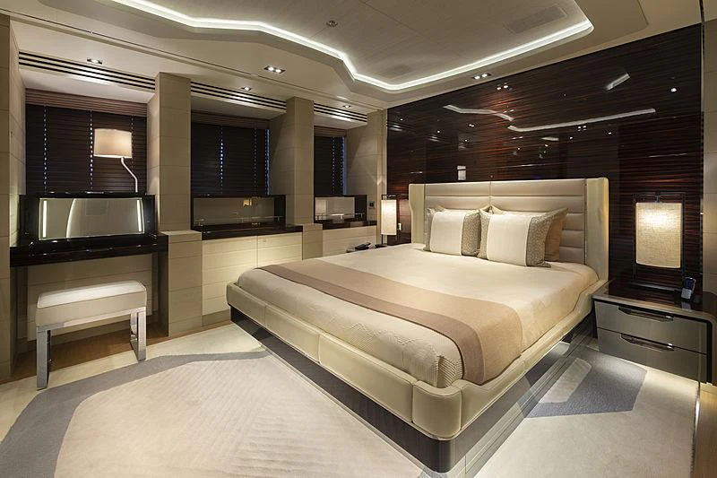a large bed in a room aboard ILLUSION Yacht for Charter