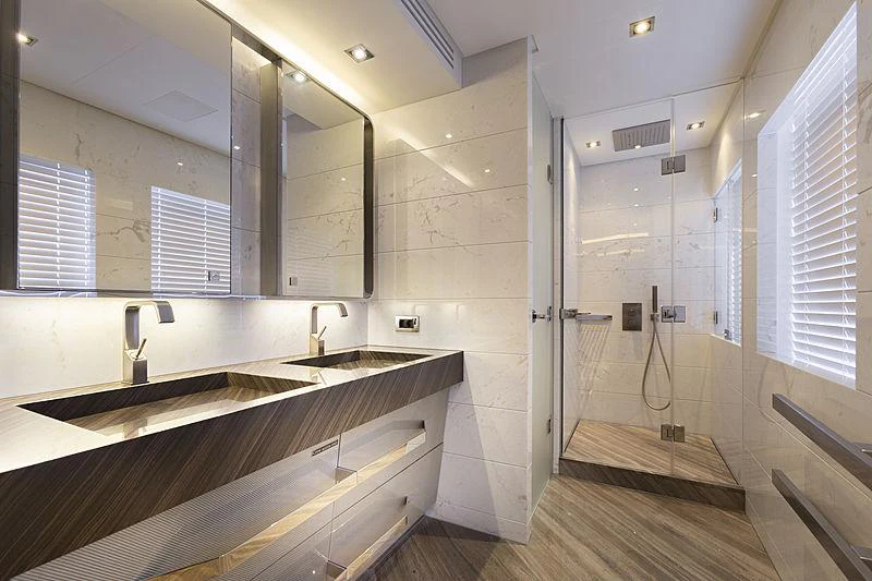 a bathroom with a large countertop aboard ILLUSION Yacht for Charter