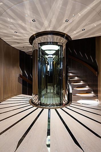 a large glass case with a glass door aboard ARTISAN Yacht for Charter