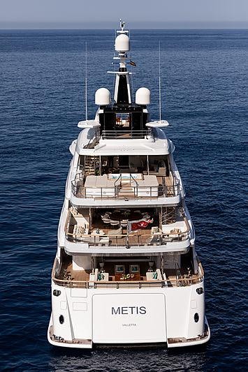 a large ship in the water aboard ARTISAN Yacht for Charter