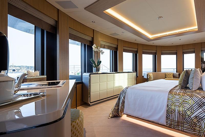 a bedroom with a large bed aboard ARTISAN Yacht for Charter