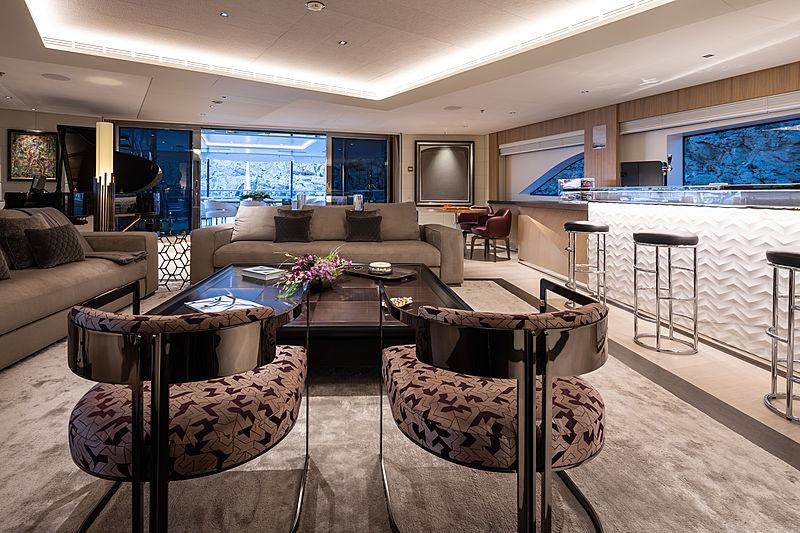 a living room with a large window aboard ARTISAN Yacht for Charter