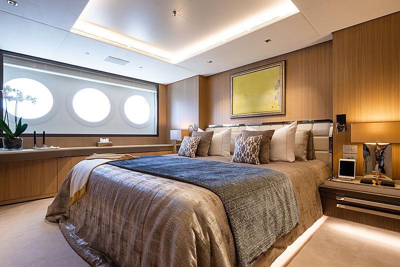a large bed in a room aboard ARTISAN Yacht for Charter