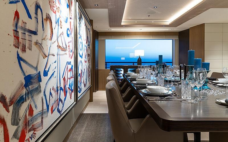 a restaurant with a large map aboard ARTISAN Yacht for Charter