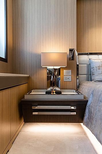 a dresser in a room aboard ARTISAN Yacht for Charter