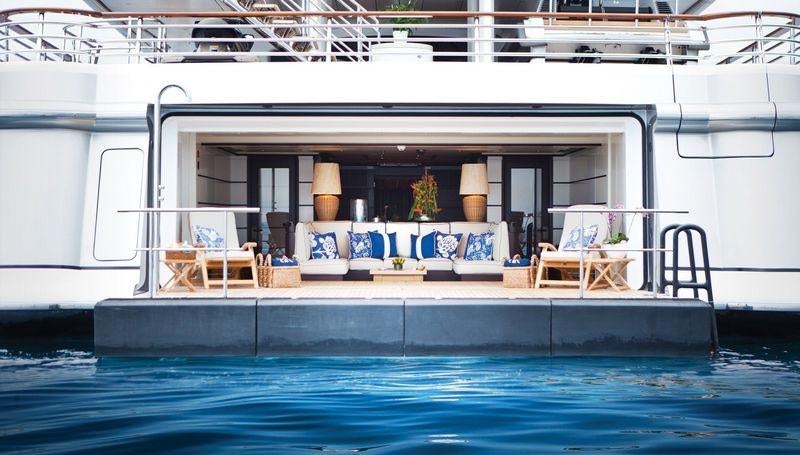 a large white house with a swimming pool aboard BATON ROUGE Yacht for Charter