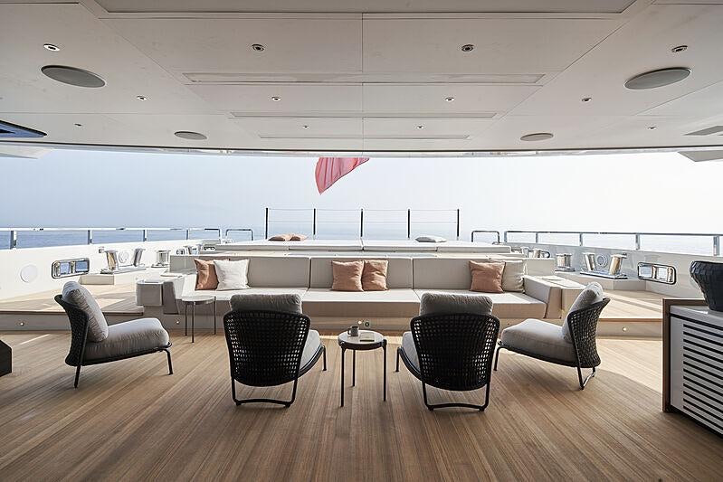 a room with a couch and chairs aboard LEMON TREE Yacht for Charter