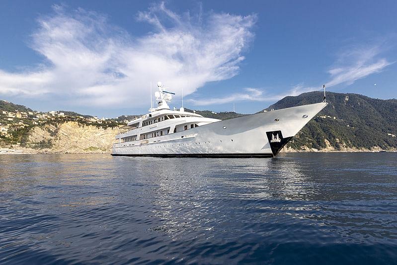 a large white ship in the water aboard ITOTO Yacht for Charter