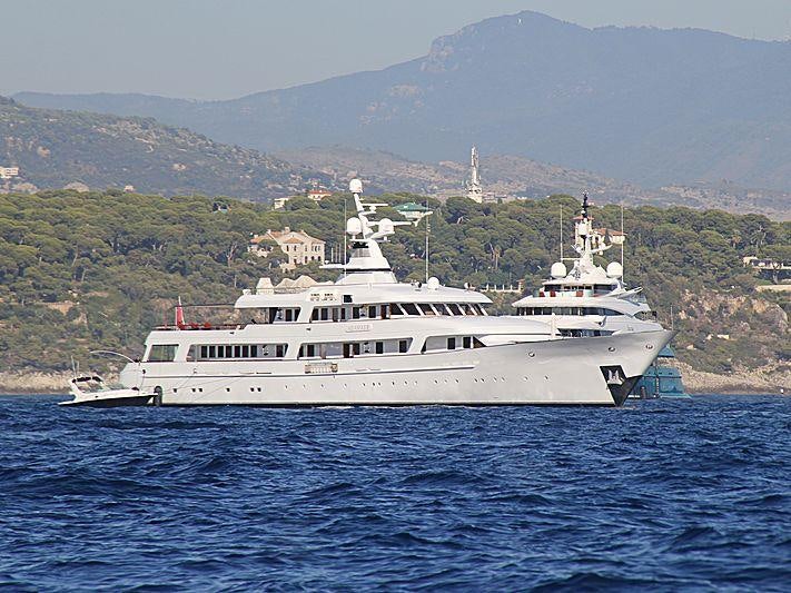 a large white boat in the water aboard ITOTO Yacht for Charter